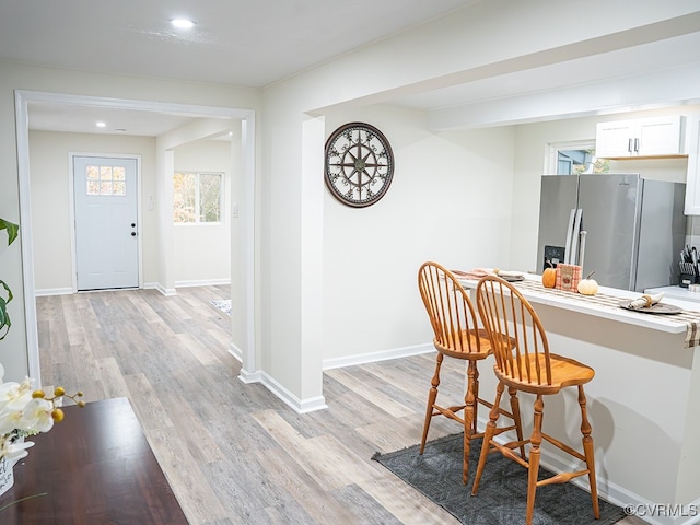 dining room featuring light hardwood / wood-style floors