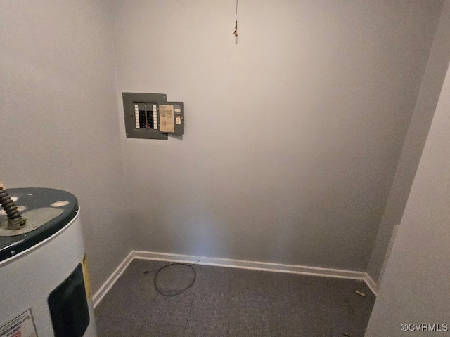 laundry area featuring water heater