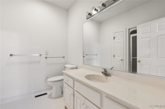 full bathroom with tile patterned floors, visible vents, toilet, baseboards, and vanity