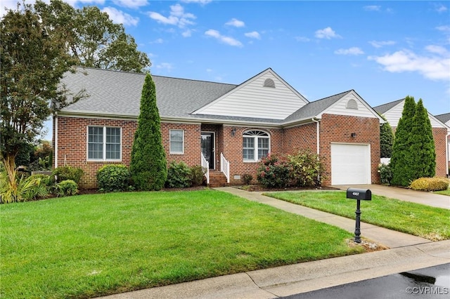 ranch-style home featuring driveway, roof with shingles, an attached garage, a front yard, and brick siding