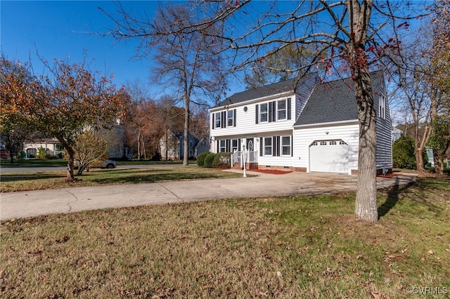 view of front facade featuring a front lawn and a garage