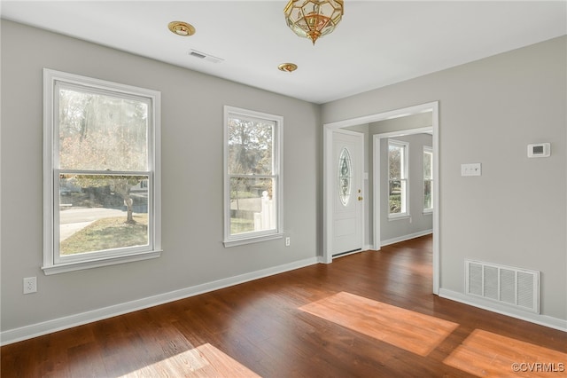 foyer featuring dark hardwood / wood-style floors