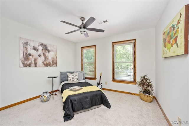 373 Land Or Dr, Ruther Glen, VA 22546 - carpeted bedroom featuring baseboards and a ceiling fan