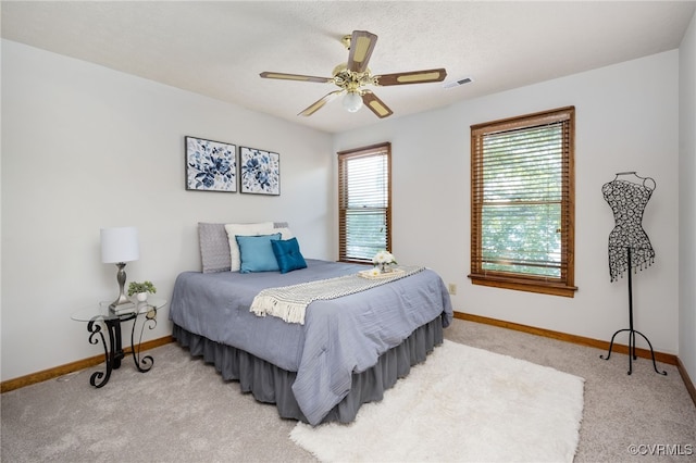 bedroom with carpet floors and ceiling fan