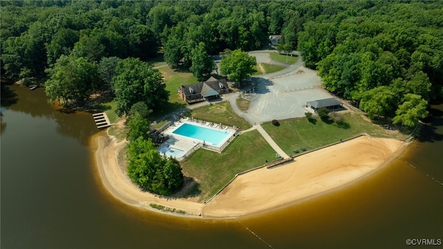 373 Land Or Dr, Ruther Glen, VA 22546 - aerial view of property's location with a pool area, a heavily wooded area, and a nearby body of water