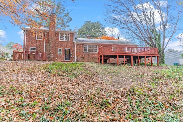 rear view of property with a deck