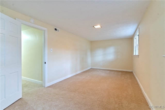 empty room with light carpet