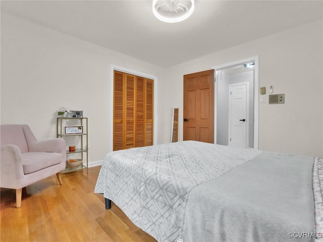 bedroom with wood-type flooring