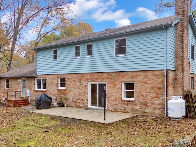 rear view of house with a patio area