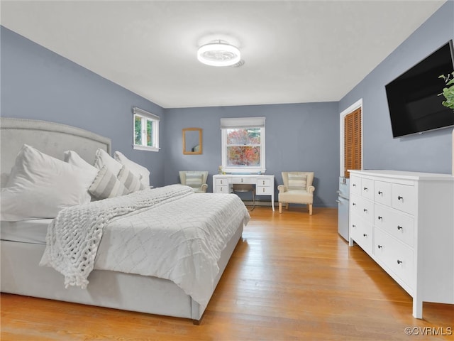 bedroom with light wood-type flooring