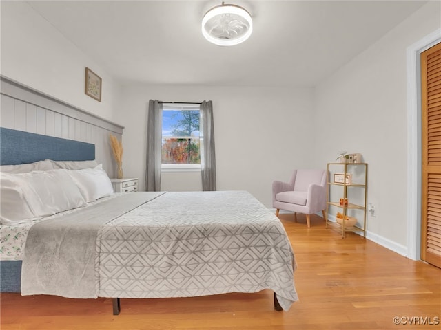 bedroom featuring hardwood / wood-style flooring