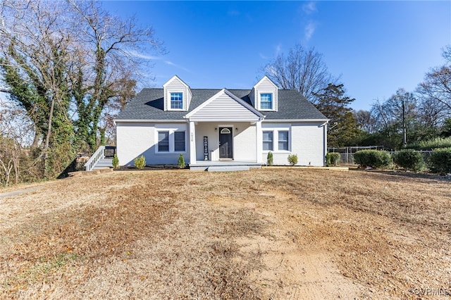 cape cod home with covered porch