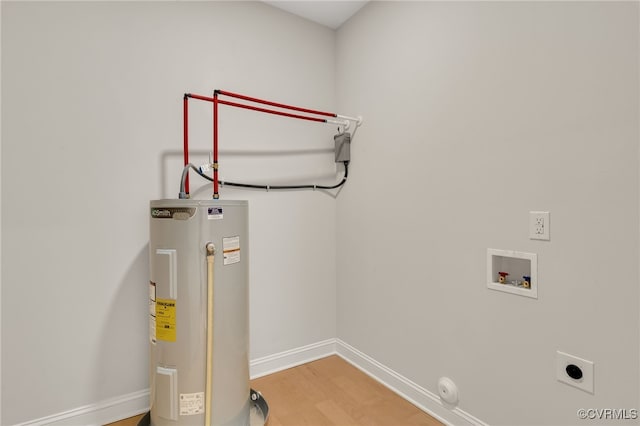 clothes washing area featuring hookup for an electric dryer, wood-type flooring, electric water heater, and hookup for a washing machine