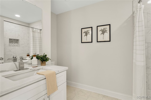 bathroom with vanity and walk in shower