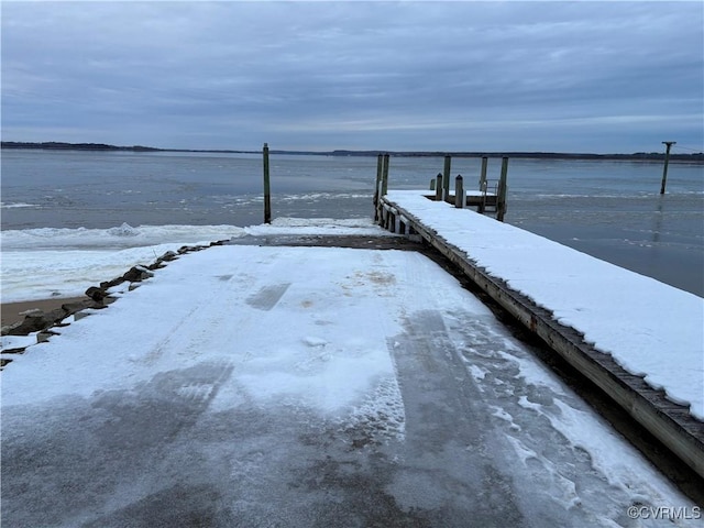 view of dock with a water view