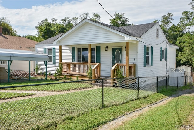 view of front of home featuring covered porch and a front yard