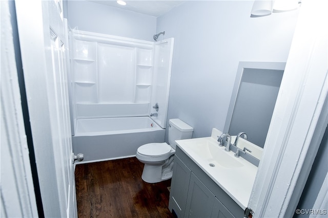 full bathroom with vanity, shower / bathtub combination, toilet, and wood-type flooring