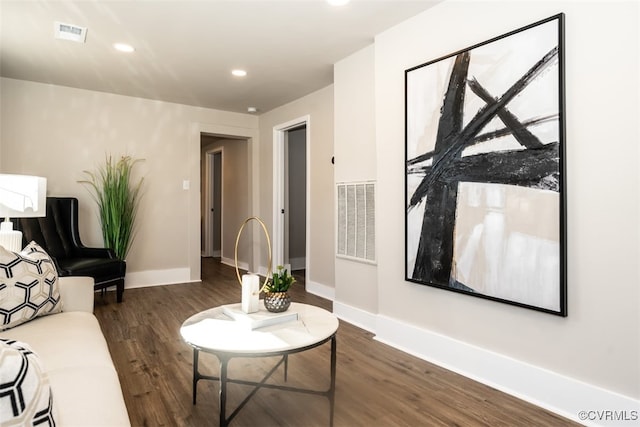 living room featuring dark hardwood / wood-style floors