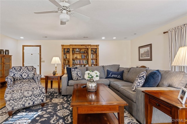 living room featuring ceiling fan