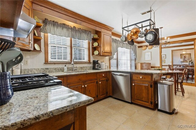 kitchen featuring kitchen peninsula, light stone counters, sink, dishwasher, and range hood