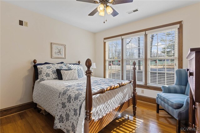 bedroom featuring ceiling fan and wood-type flooring