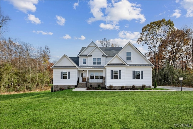 craftsman-style house with a front lawn