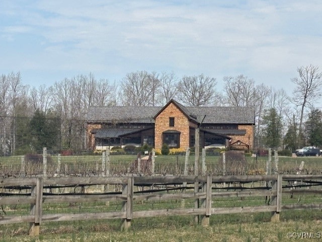 exterior space with a fenced front yard