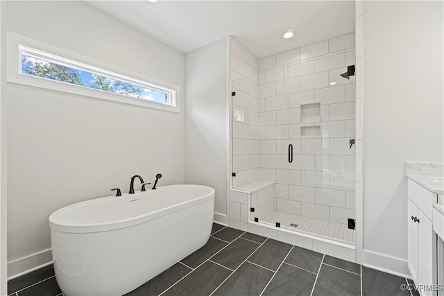 bathroom with plus walk in shower and vanity