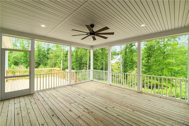 exterior space with ceiling fan