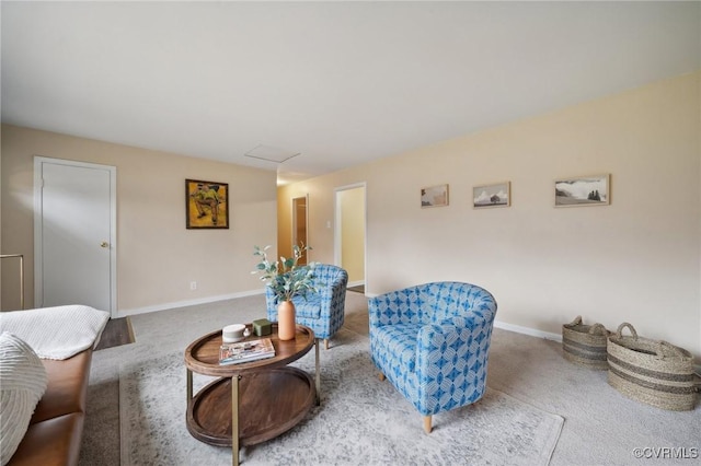 sitting room featuring carpet floors