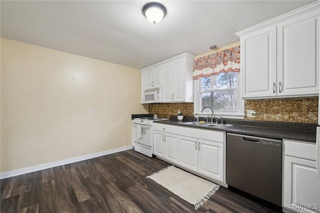 kitchen with decorative backsplash, white appliances, dark wood-type flooring, sink, and white cabinets