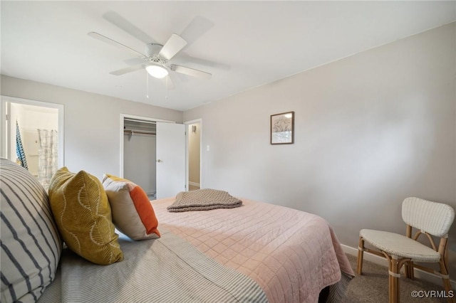 carpeted bedroom featuring a closet and ceiling fan