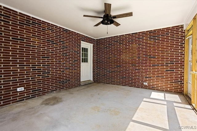 view of patio featuring ceiling fan