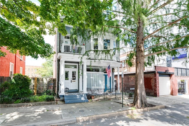 view of front of house with a balcony