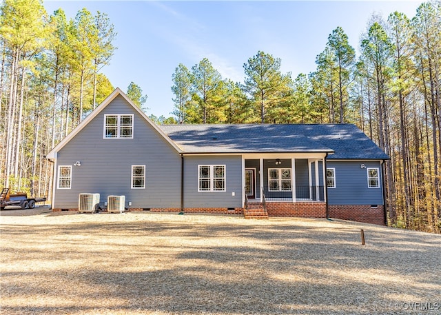 view of front of property with central AC unit and covered porch