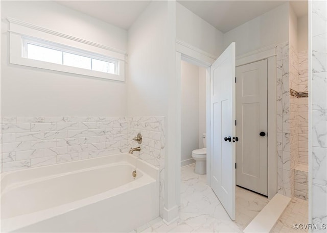 bathroom featuring toilet and a bathing tub