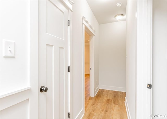 hallway with light wood-type flooring