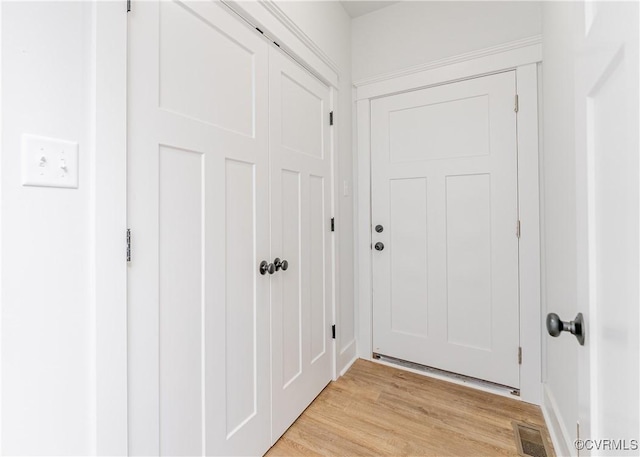 entryway with light wood-type flooring