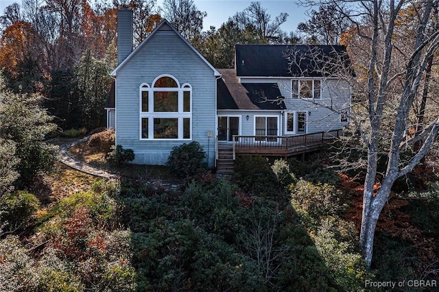 rear view of house with a deck