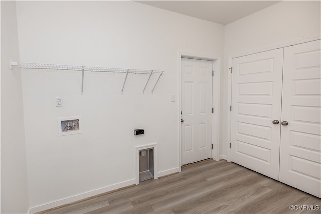 washroom featuring light wood-type flooring and hookup for a washing machine