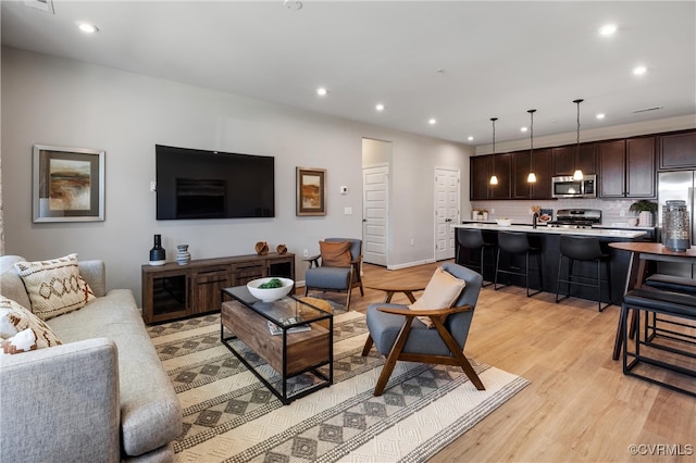 living room with light wood-type flooring