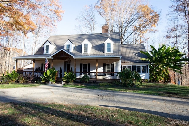 cape cod house with covered porch