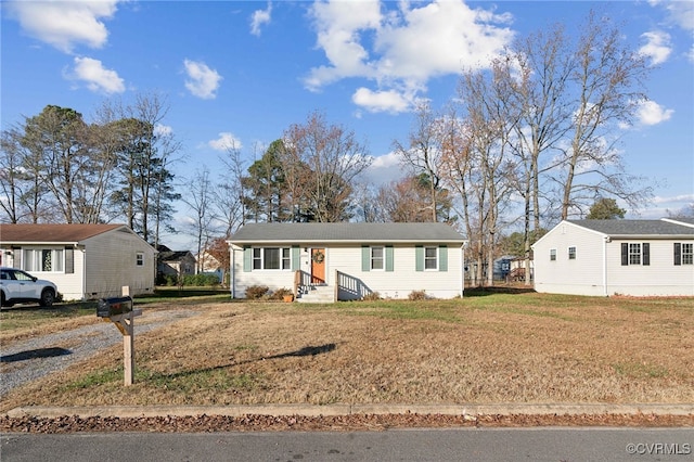 view of front of home with a front lawn