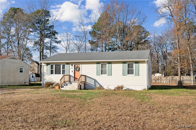 view of front of property featuring a front lawn