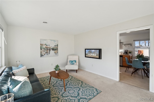 living room featuring carpet flooring