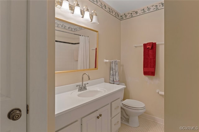 bathroom featuring tile patterned flooring, vanity, curtained shower, and toilet