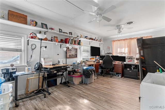 office area with ceiling fan, ornamental molding, and light hardwood / wood-style flooring