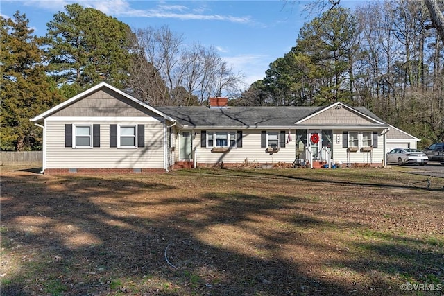 single story home with a front lawn