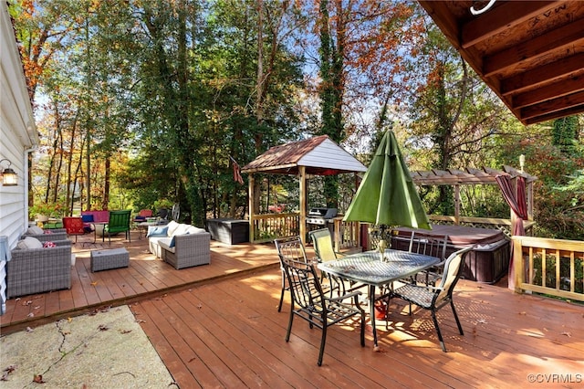 wooden terrace with an outdoor hangout area