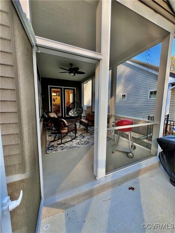 view of patio with ceiling fan